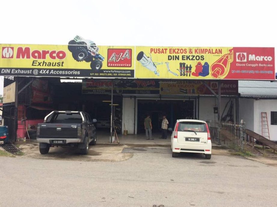 pusat membaiki kereta ekzos